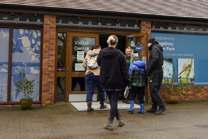 Group of people entering the visitor centre